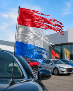 Colorful metallic antenna flags and streamers for car dealership lot displays